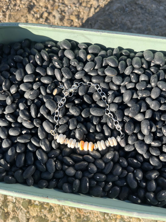 White Buffalo, Spiny Oyster, and Navajo Pearl beaded bracelet